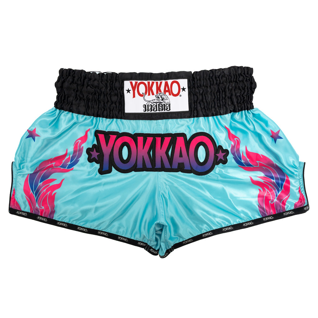 Turquoise Muay Thai shorts with pink flames and Yokkao branding